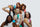 Six models showing the diversity of hair the system is built for, each holding an Oli G product